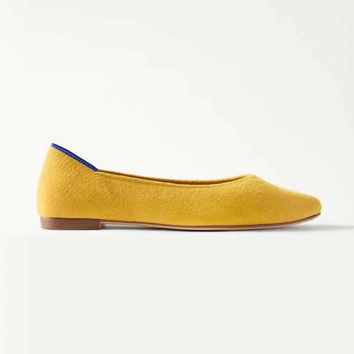 side | The Point III in ReVelvet Saffron shown from the side.