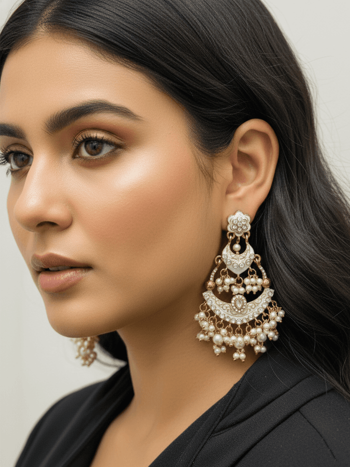 Tiered Polki Chaandbali With Pearl Jhumkas.