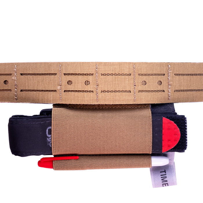 Front side of a Kore Essentials Coyote Laser Cut Molle Battle Belt with a Coyote Tourniquets holder attached