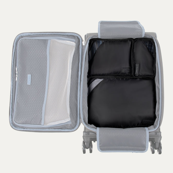 Top view of open carry-on with Travelpro Essentials 3 Pack Packing Cube Set in BLACK, neatly packed to maximize space.