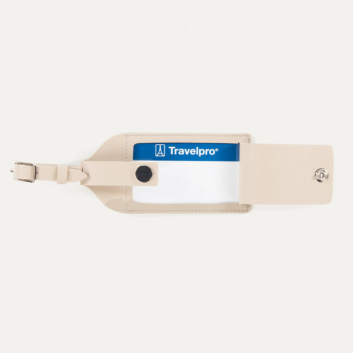 Open view of Travelpro Essentials Leather Luggage Tag in Khaki, with ID window and snap-closure privacy flap.