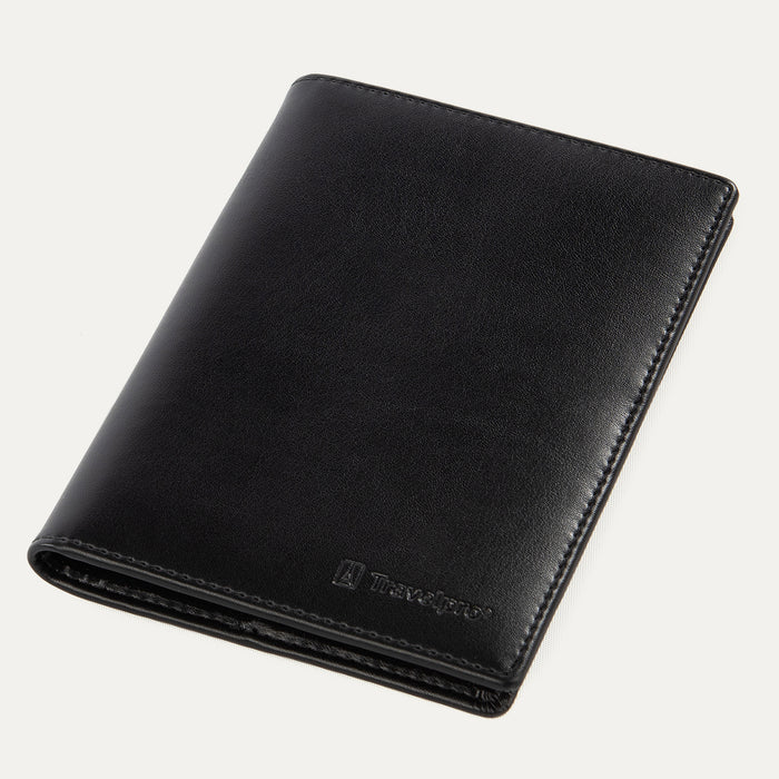 A black leather passport cover with the Travelpro brand logo visible on the lower side.