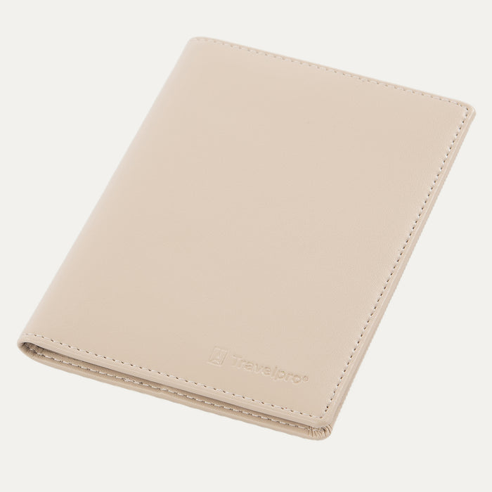 Khaki Travelpro® leather passport cover displayed closed at an angle, featuring clean stitching and a subtle embossed logo on the bottom right corner.