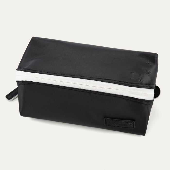 MaxAccess Cubes™ Large Organizer in black with a contrasting white zipper,  durable fabric, and stitched Travelpro logo patch