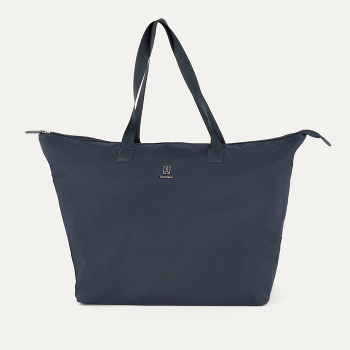 Front view of the Travelpro Essentials SparePack Foldable Tote 2.0 in Navy, highlighting its spacious design, durable carry handles, and lightweight, abrasion-resistant fabric.