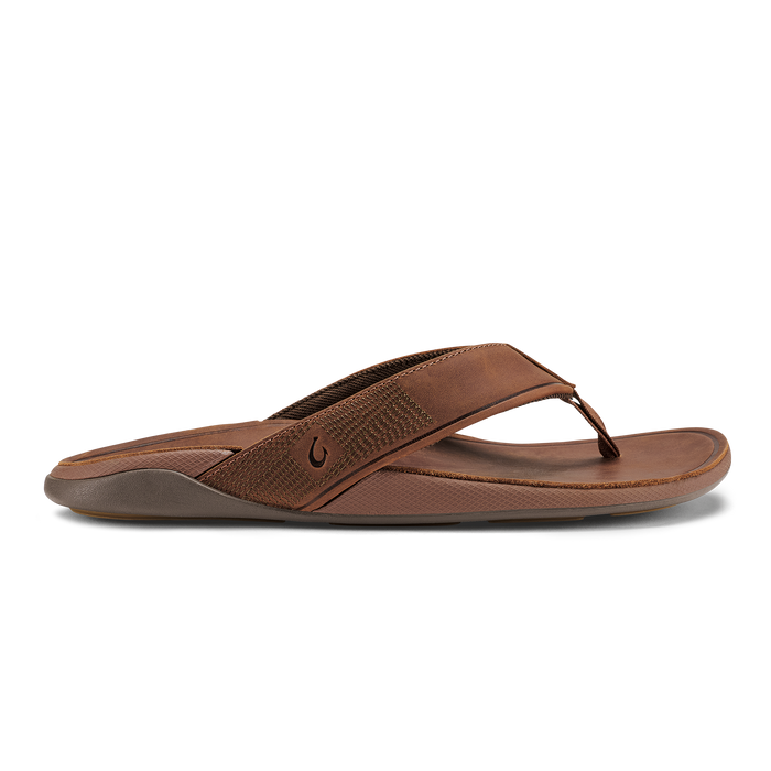 Brown leather thong sandal with textured upper strap and contoured sole in bisque color.