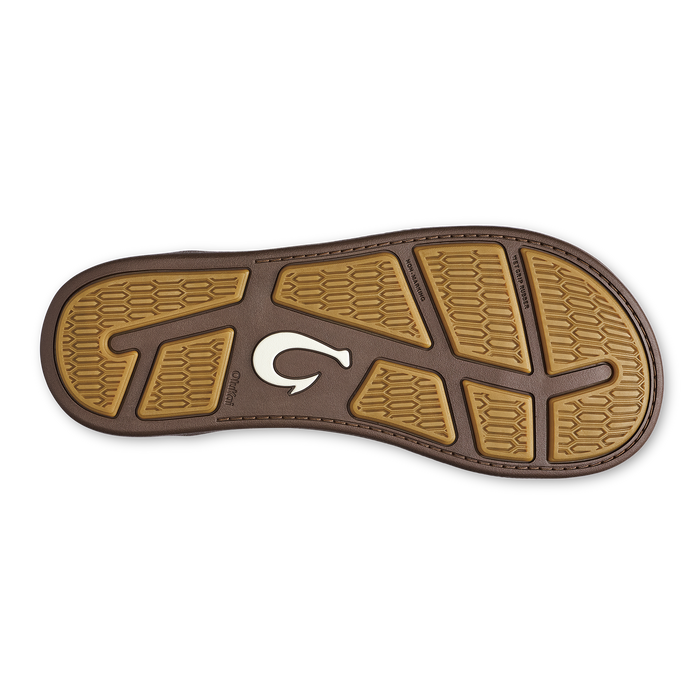Brown and tan shoe sole with geometric tread pattern and white curved logo.