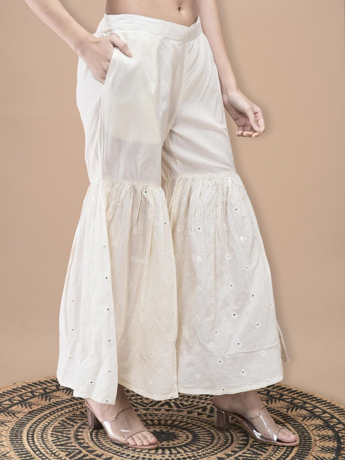 Women Cotton Off White Embroidered Kurta Sharara Dupatta.