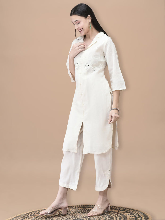 Women Cotton Off White Embroidered Kurta With Comfort Pant.