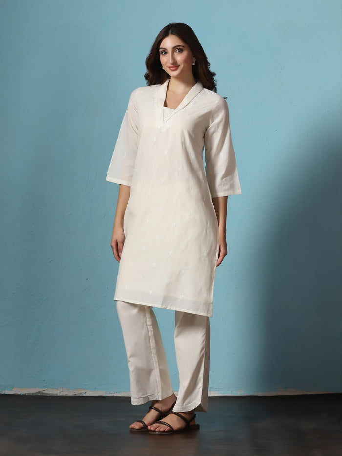 Women Cotton Off White Embroidered Kurta With Comfort Pant.