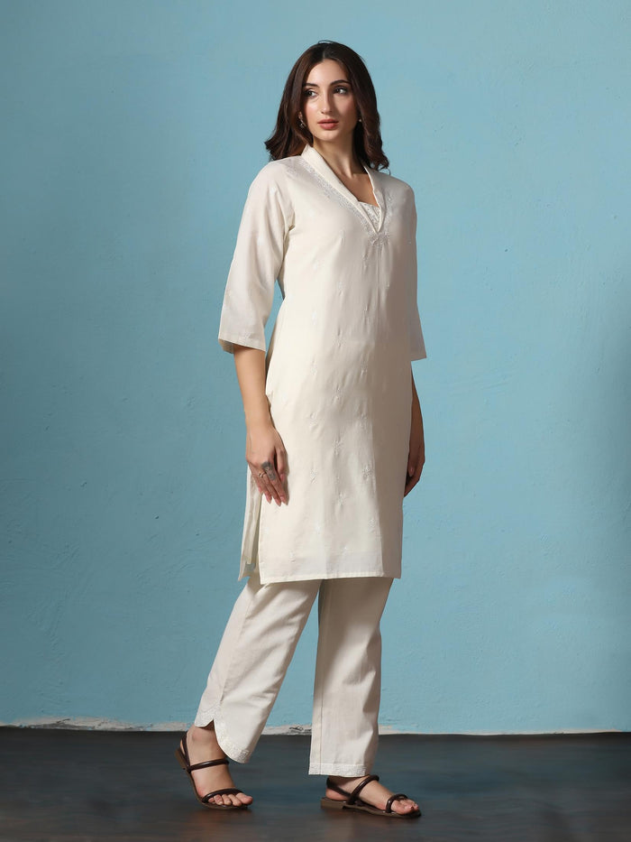 Women Cotton Off White Embroidered Kurta With Comfort Pant.