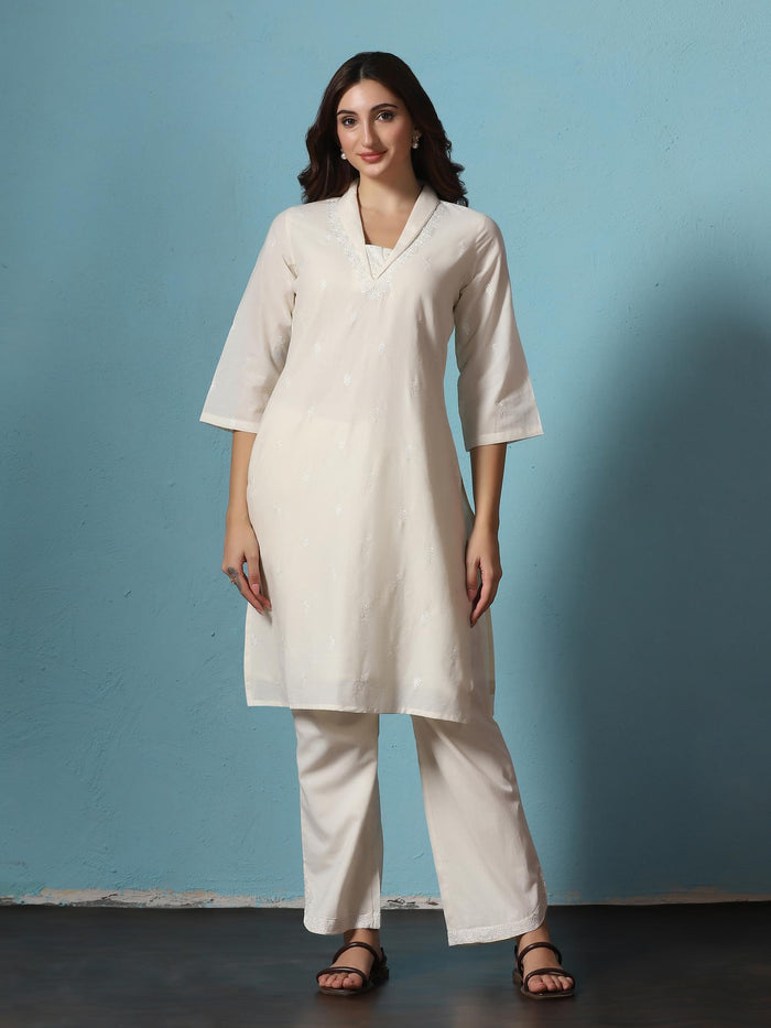 Women Cotton Off White Embroidered Kurta With Comfort Pant.