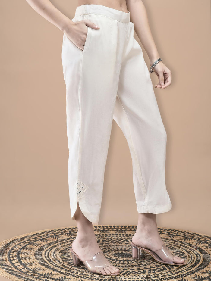 Women Cotton Off White Embroidered Kurta With Comfort Pant.