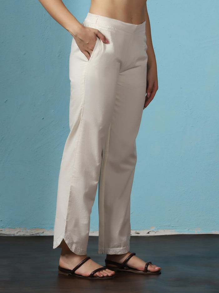 Women Cotton Off White Embroidered Kurta With Comfort Pant.