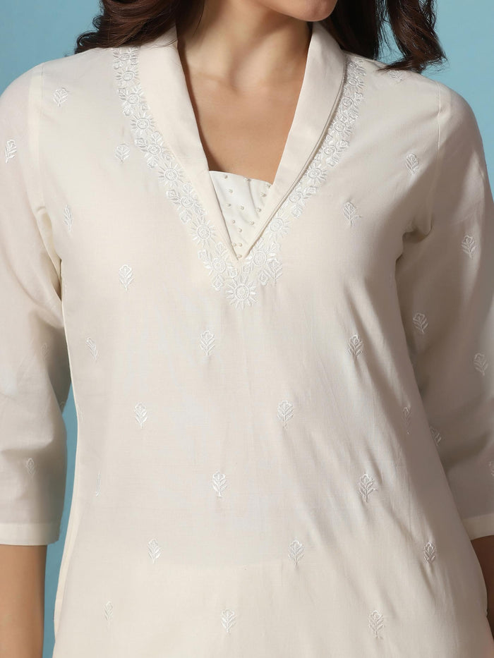 Women Cotton Off White Embroidered Kurta With Comfort Pant.