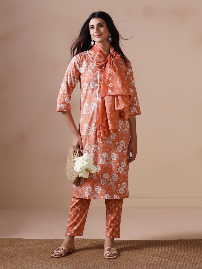 Women Cotton Peach Floral Print KurtaTrouser Dupatta.
