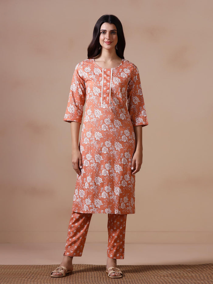 Women Cotton Peach Floral Print KurtaTrouser Dupatta.