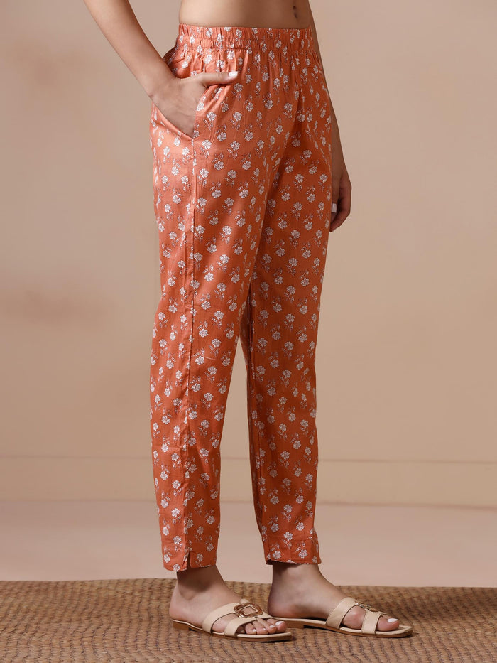 Women Cotton Peach Floral Print KurtaTrouser Dupatta.