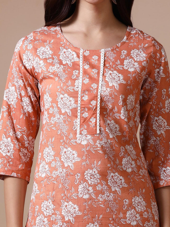 Women Cotton Peach Floral Print KurtaTrouser Dupatta.