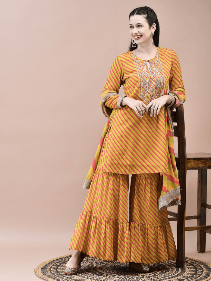 Women Georgette Mustard Embroidered Kurta Sharara Dupatta.
