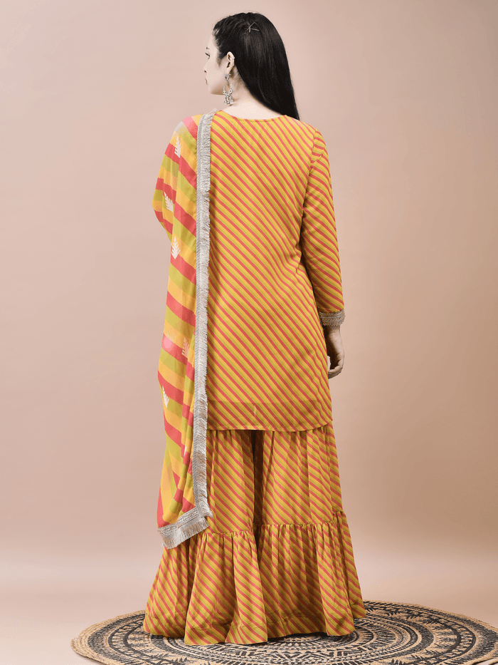 Women Georgette Mustard Embroidered Kurta Sharara Dupatta.