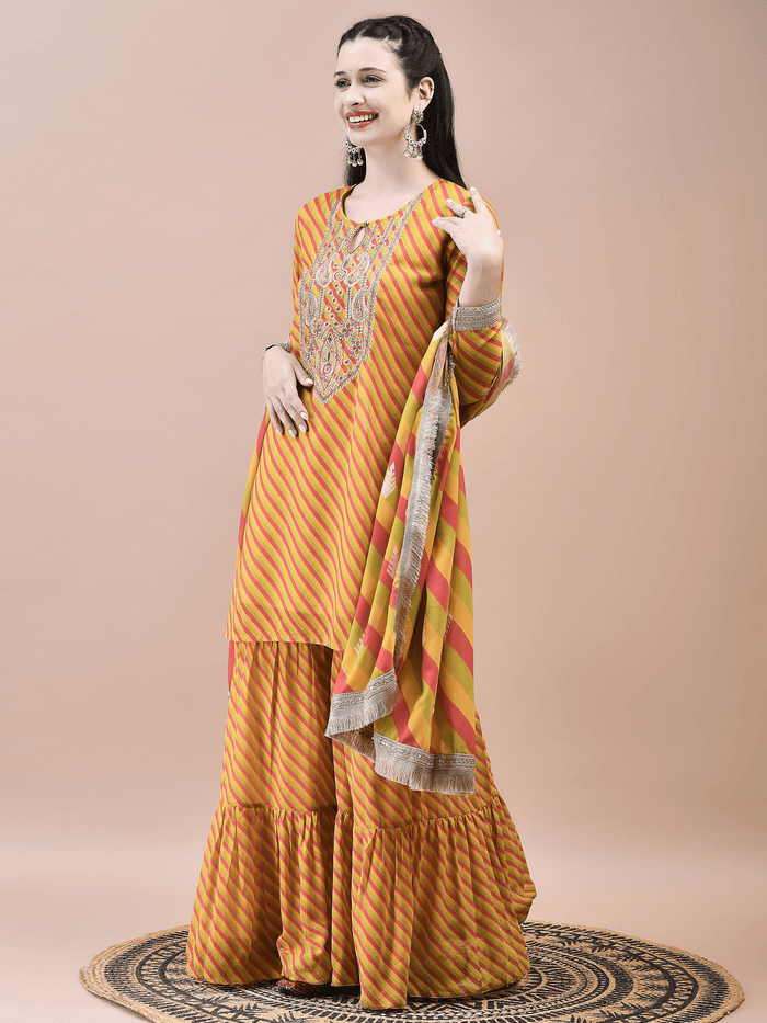 Women Georgette Mustard Embroidered Kurta Sharara Dupatta.