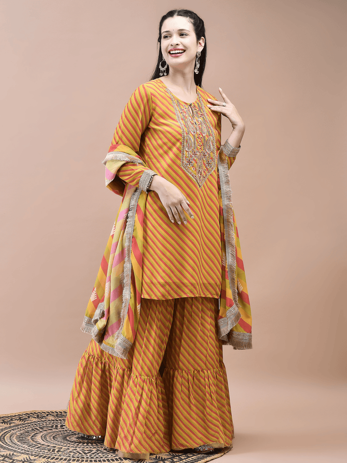 Women Georgette Mustard Embroidered Kurta Sharara Dupatta.