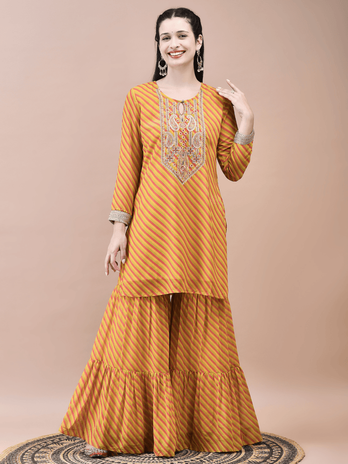 Women Georgette Mustard Embroidered Kurta Sharara Dupatta.