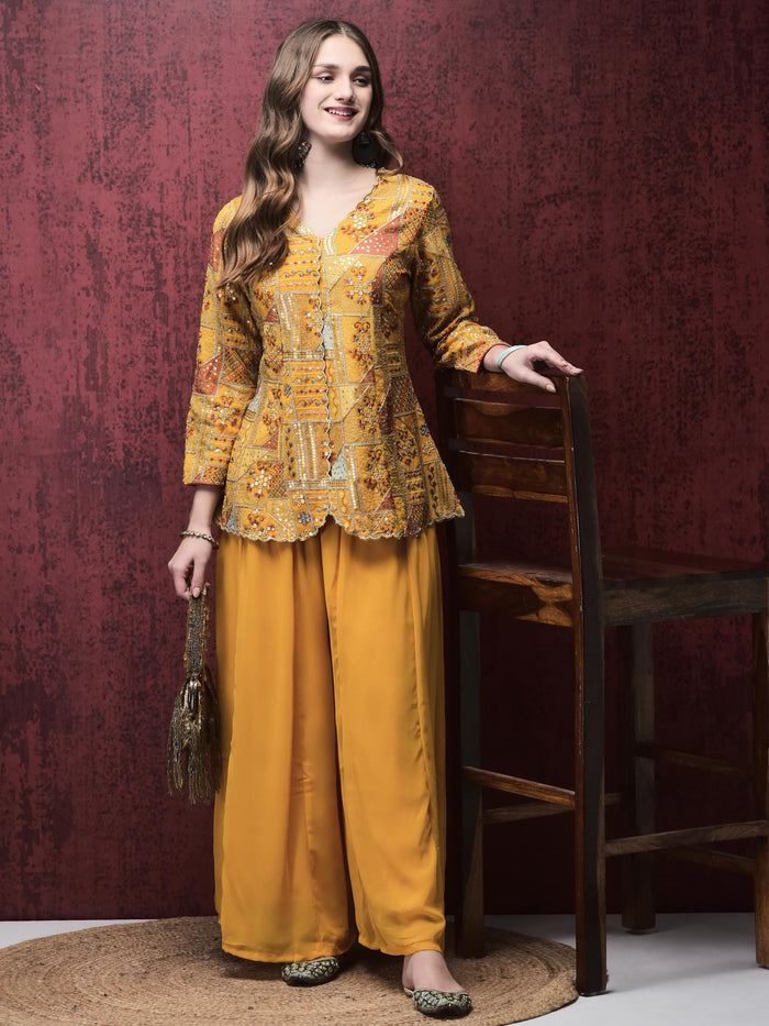 Women Georgette Yellow Embroidered Kurta With Flared Split Pant.