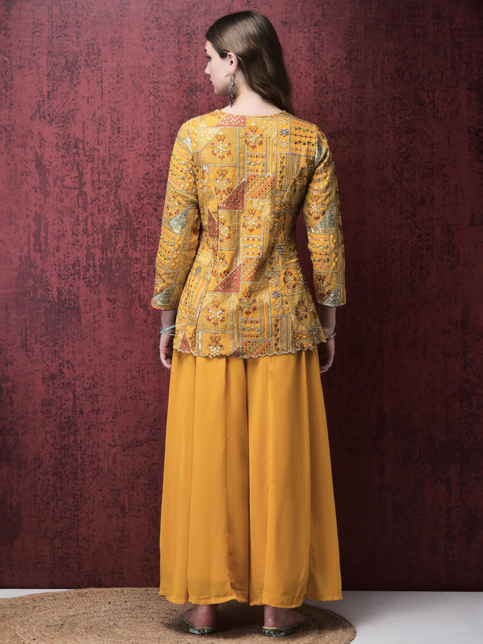 Women Georgette Yellow Embroidered Kurta With Flared Split Pant.