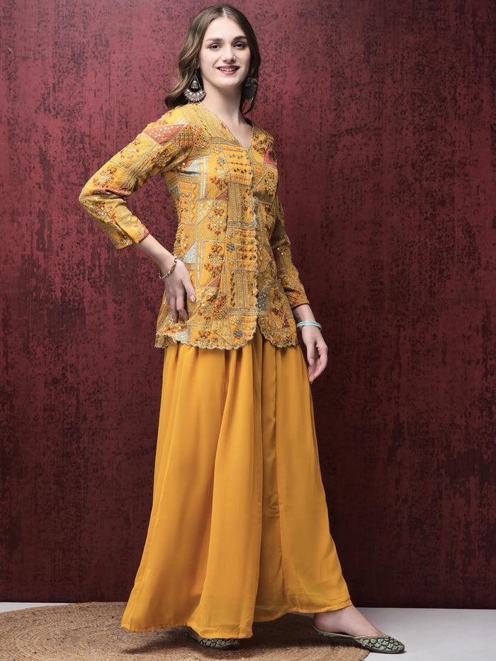 Women Georgette Yellow Embroidered Kurta With Flared Split Pant.