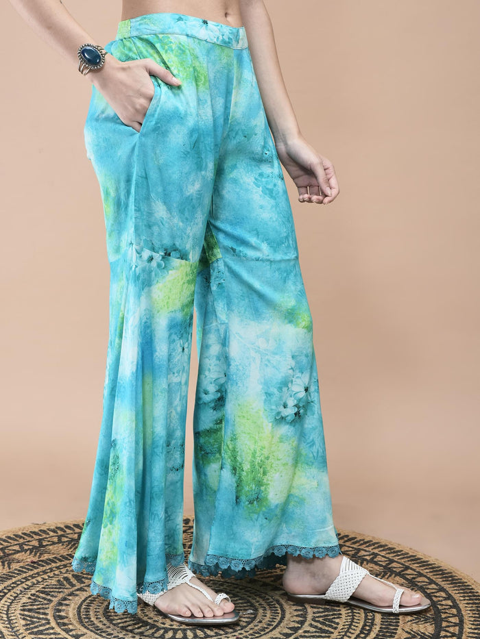 Women Liva Aqua Blue Abstract Print Kurta Sharara Dupatta.