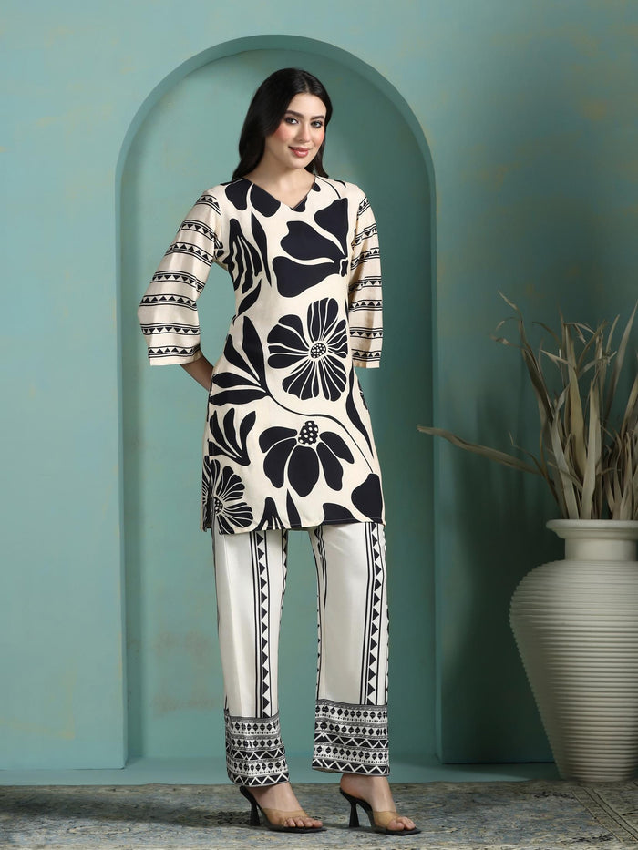 Women Liva Cream and Black Printed Kurta With Comfort Pant.