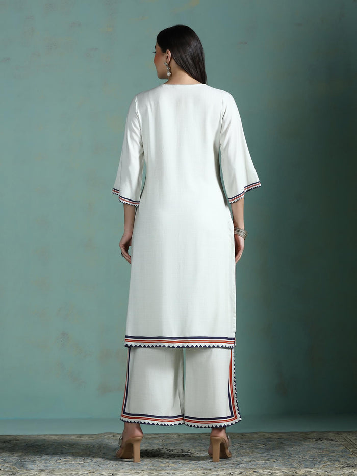 Women Liva Cream Printed Kurta With Comfort Pant.