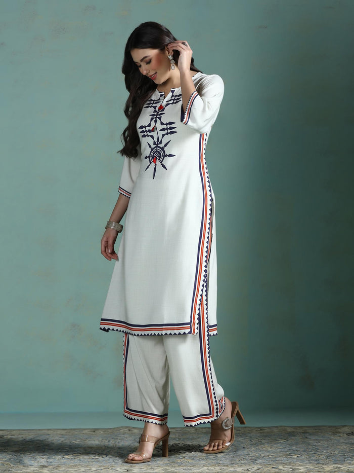 Women Liva Cream Printed Kurta With Comfort Pant.