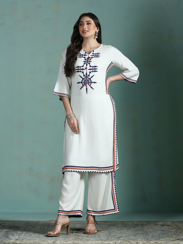 Women Liva Cream Printed Kurta With Comfort Pant.