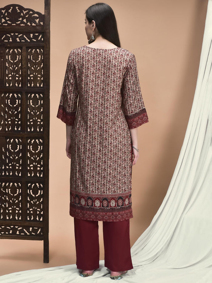 Women Liva Maroon Ornamental Print Kurta With Comfort Pant.