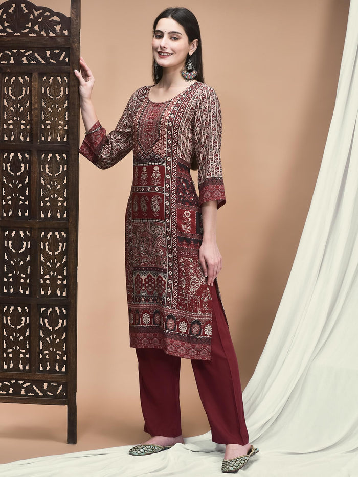 Women Liva Maroon Ornamental Print Kurta With Comfort Pant.