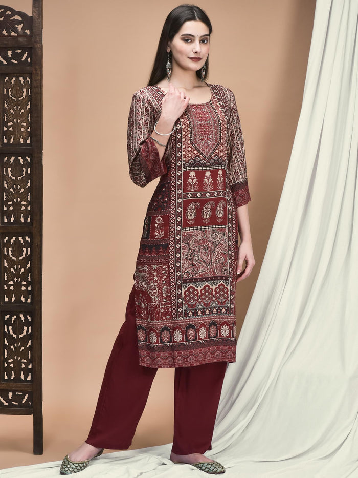 Women Liva Maroon Ornamental Print Kurta With Comfort Pant.