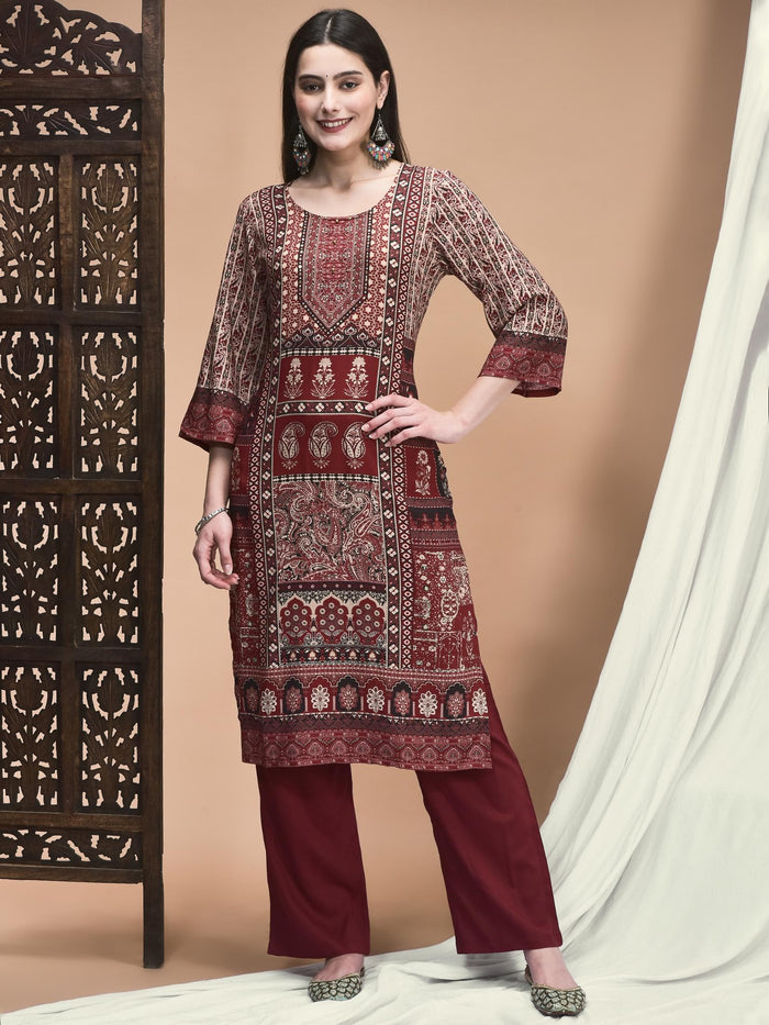 Women Liva Maroon Ornamental Print Kurta With Comfort Pant.