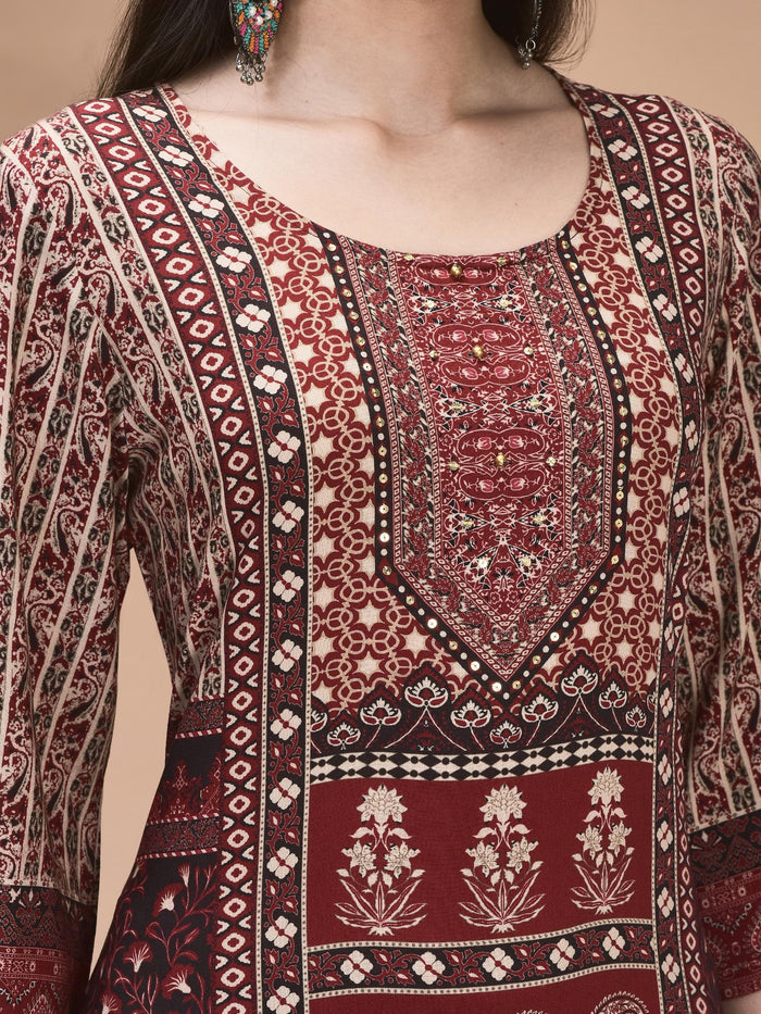 Women Liva Maroon Ornamental Print Kurta With Comfort Pant.