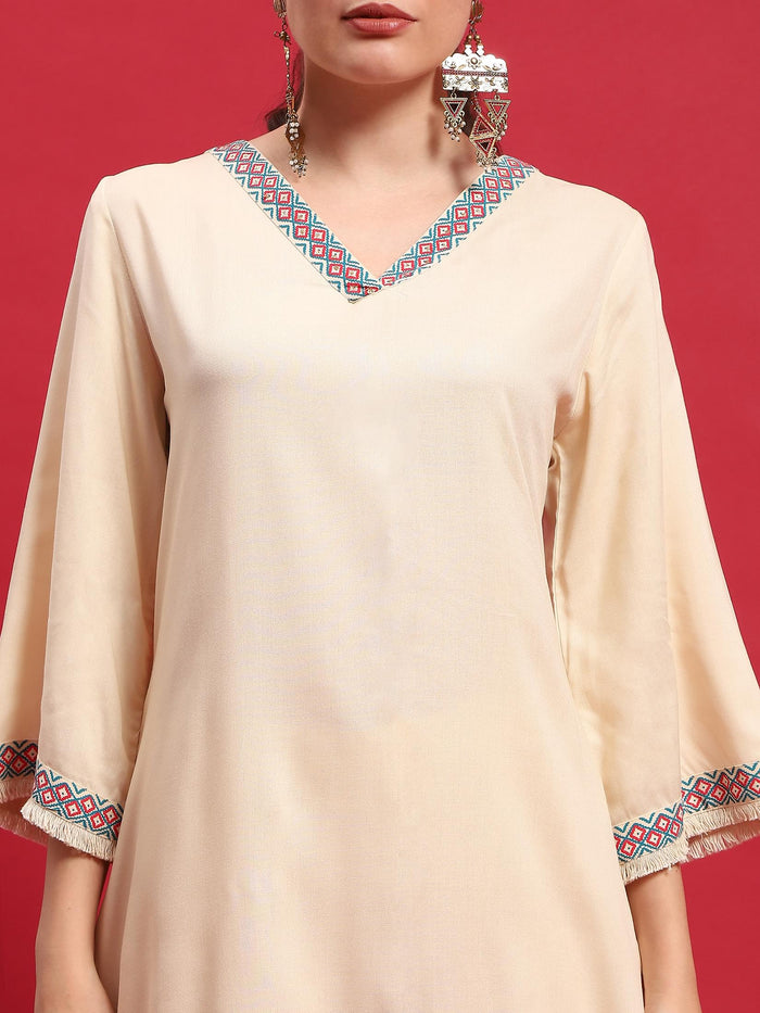 Women Liva Rayon Beige Solid Kurta With Comfort Pant.
