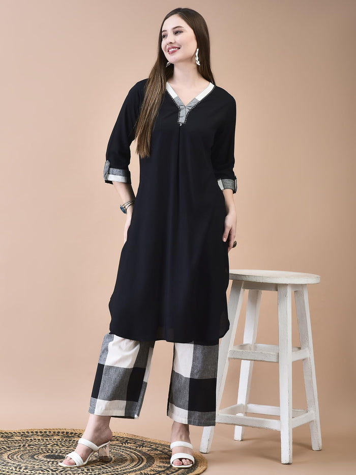 Women Liva (Rayon) Black Solid Kurta With Cotton Comfort Pant.