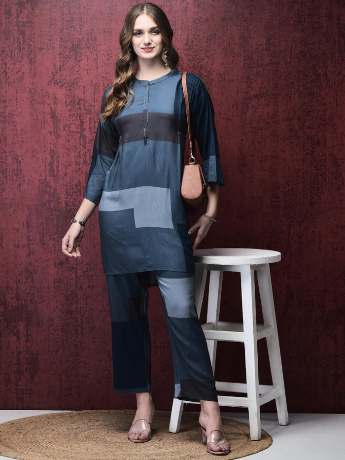 Women Liva (Rayon) Blue Geometric Print Kurta With Comfort Pant.