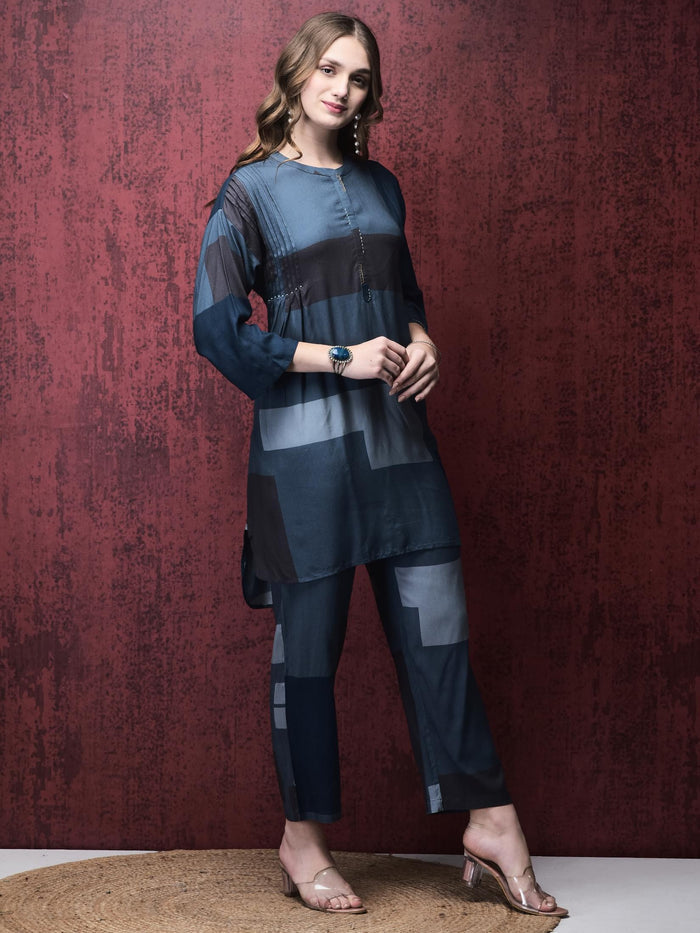 Women Liva (Rayon) Blue Geometric Print Kurta With Comfort Pant.