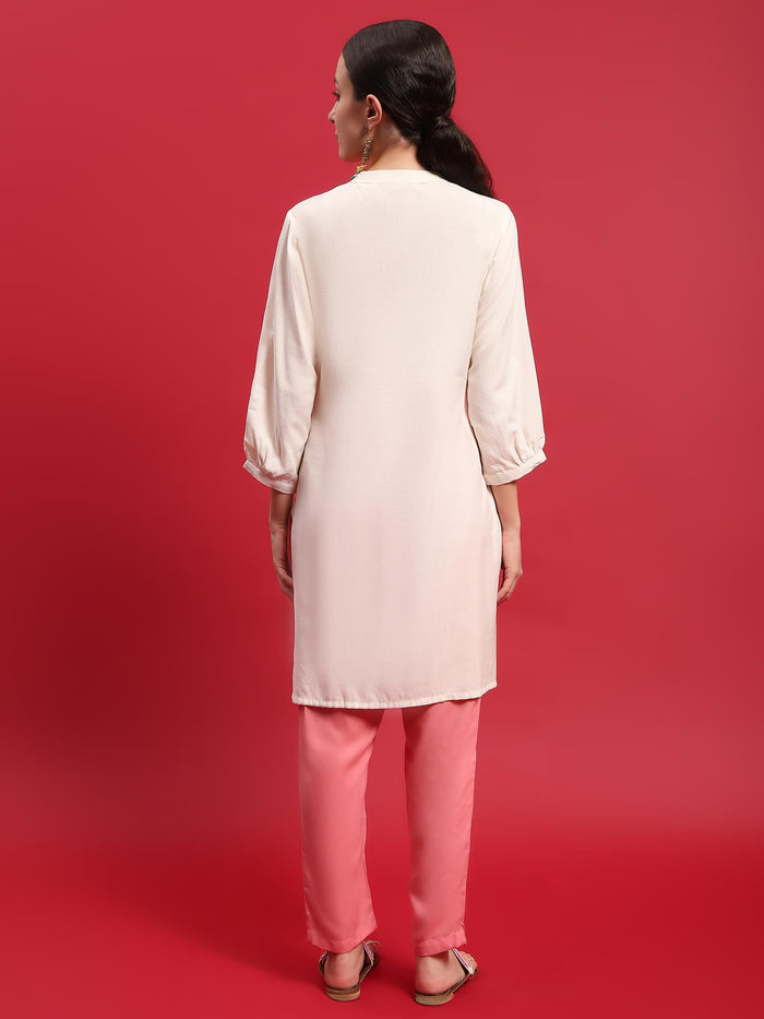 Women Liva Rayon Cream Solid Kurta With Trouser.