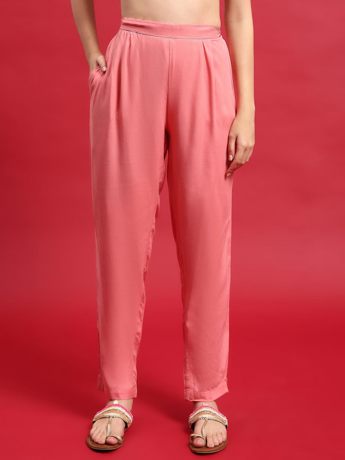 Women Liva Rayon Cream Solid Kurta With Trouser.