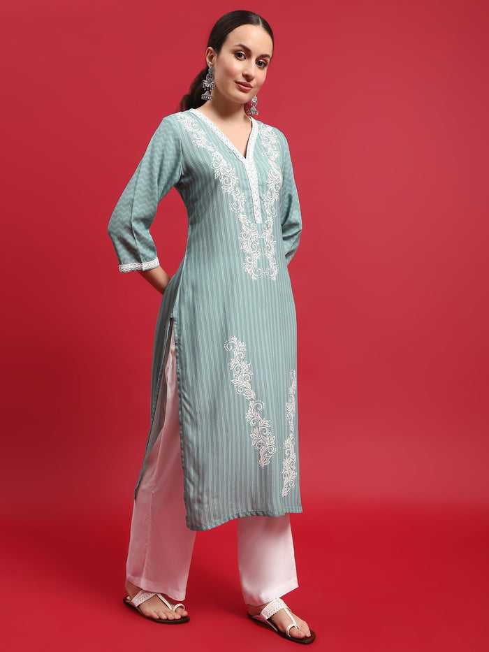 Women Liva (Rayon) Green Ornamental Print Kurta With Comfort Pant.
