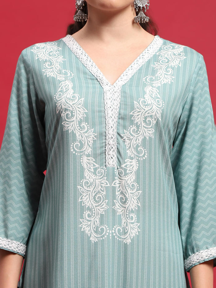 Women Liva (Rayon) Green Ornamental Print Kurta With Comfort Pant.
