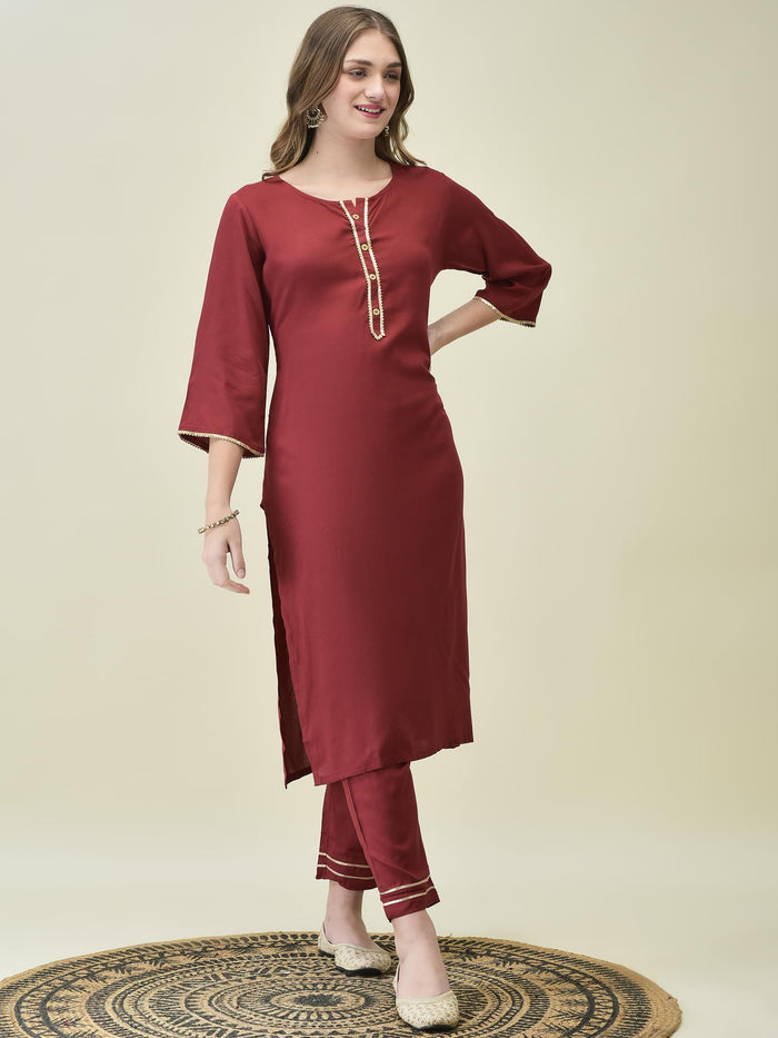 Women Liva Rayon Maroon Solid Kurta Trouser Dupatta.